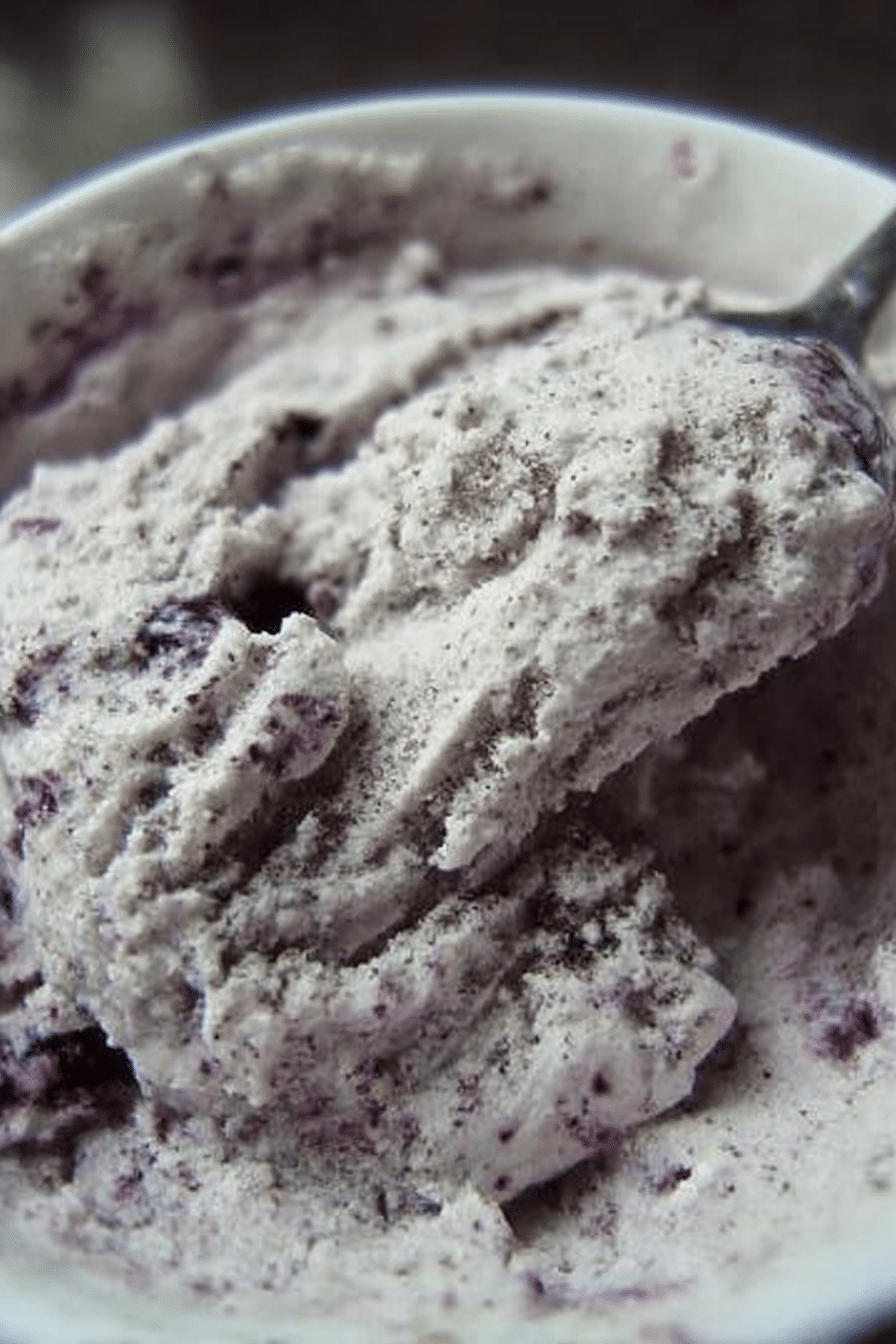 Delicious blueberry ice cream shaved ice topped with fresh blueberries and condensed milk.