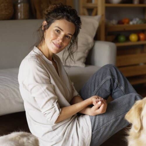 Sitting with my dog indoors.