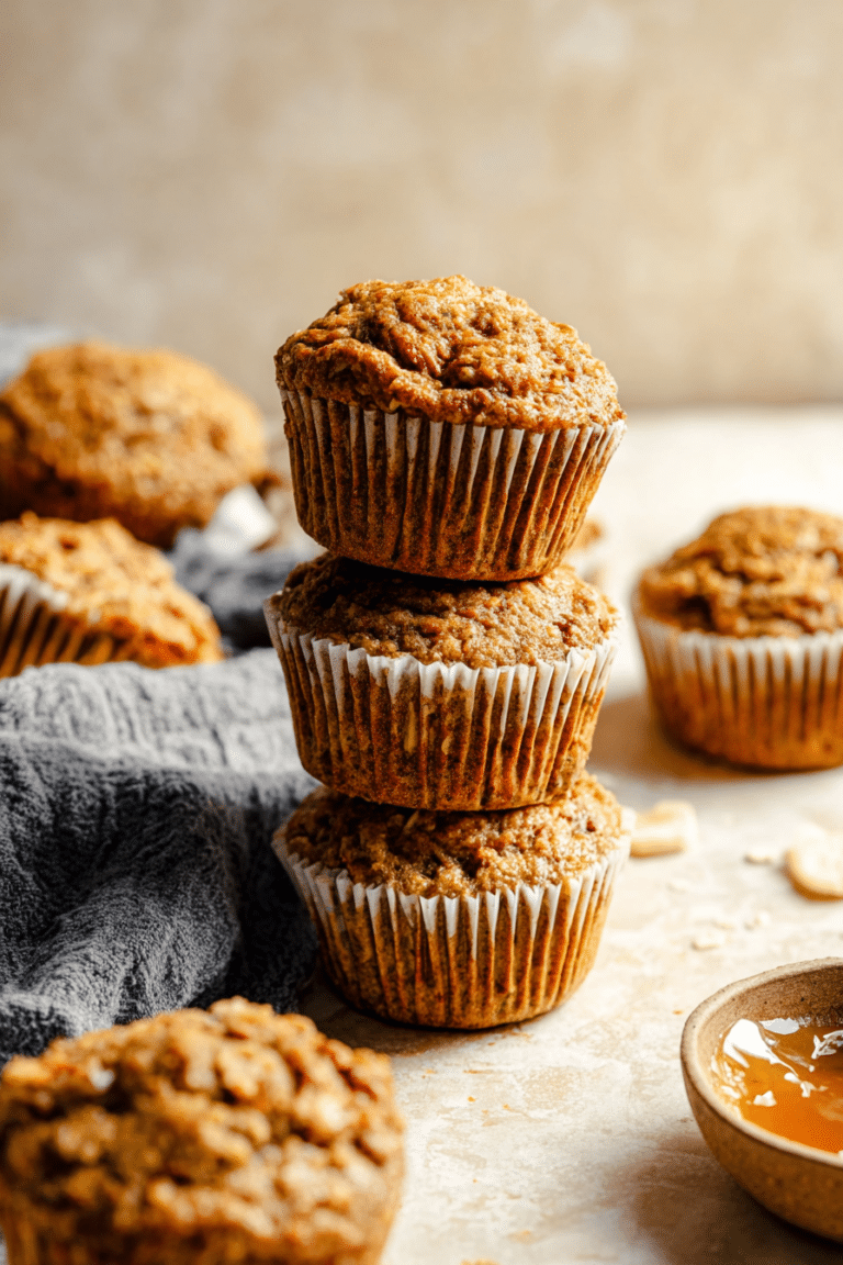 Delicious ABC muffins made with apple, banana, and carrots served with fresh fruit